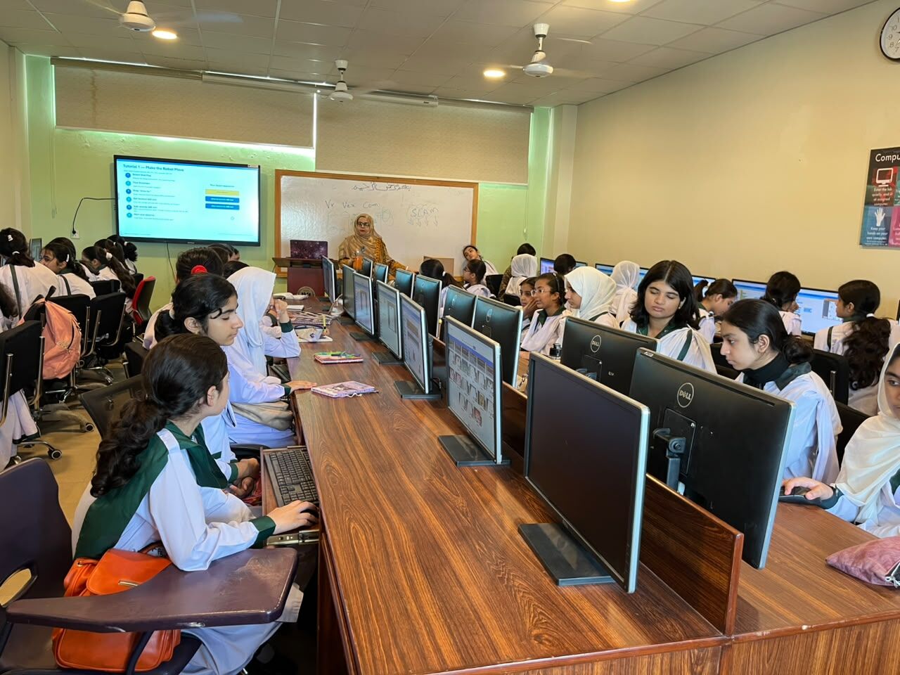 Classroom and computer lab session with students at APS Humayun Road